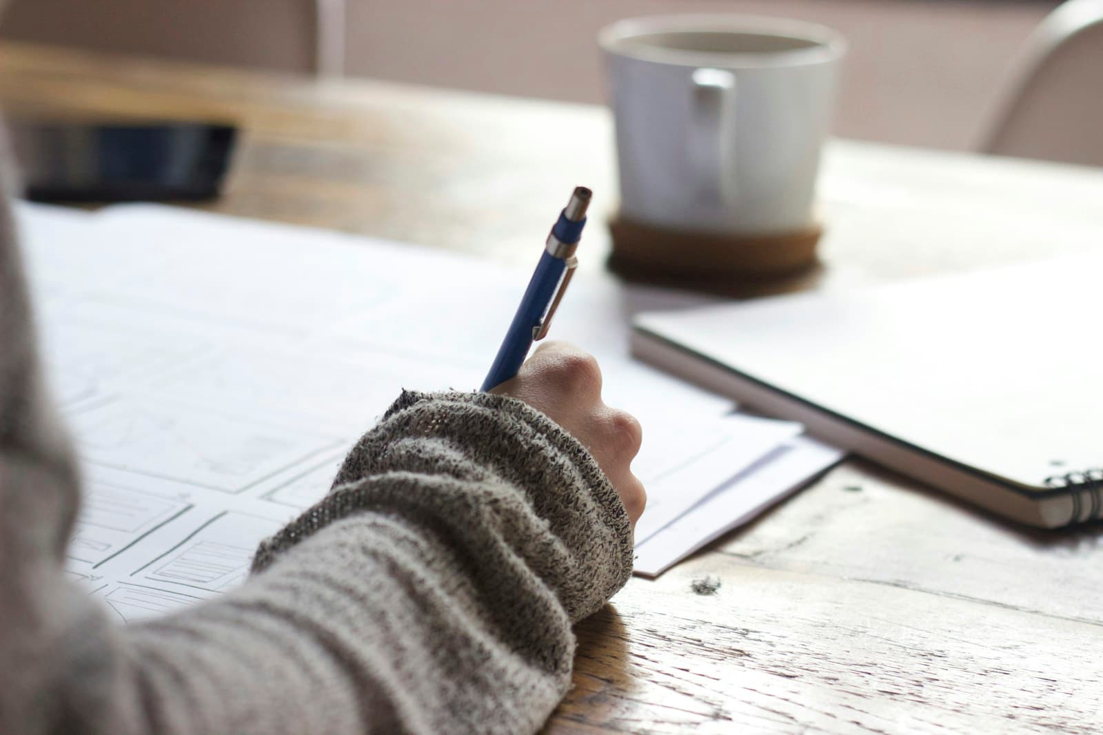 Learner studying healthcare training materials at a desk